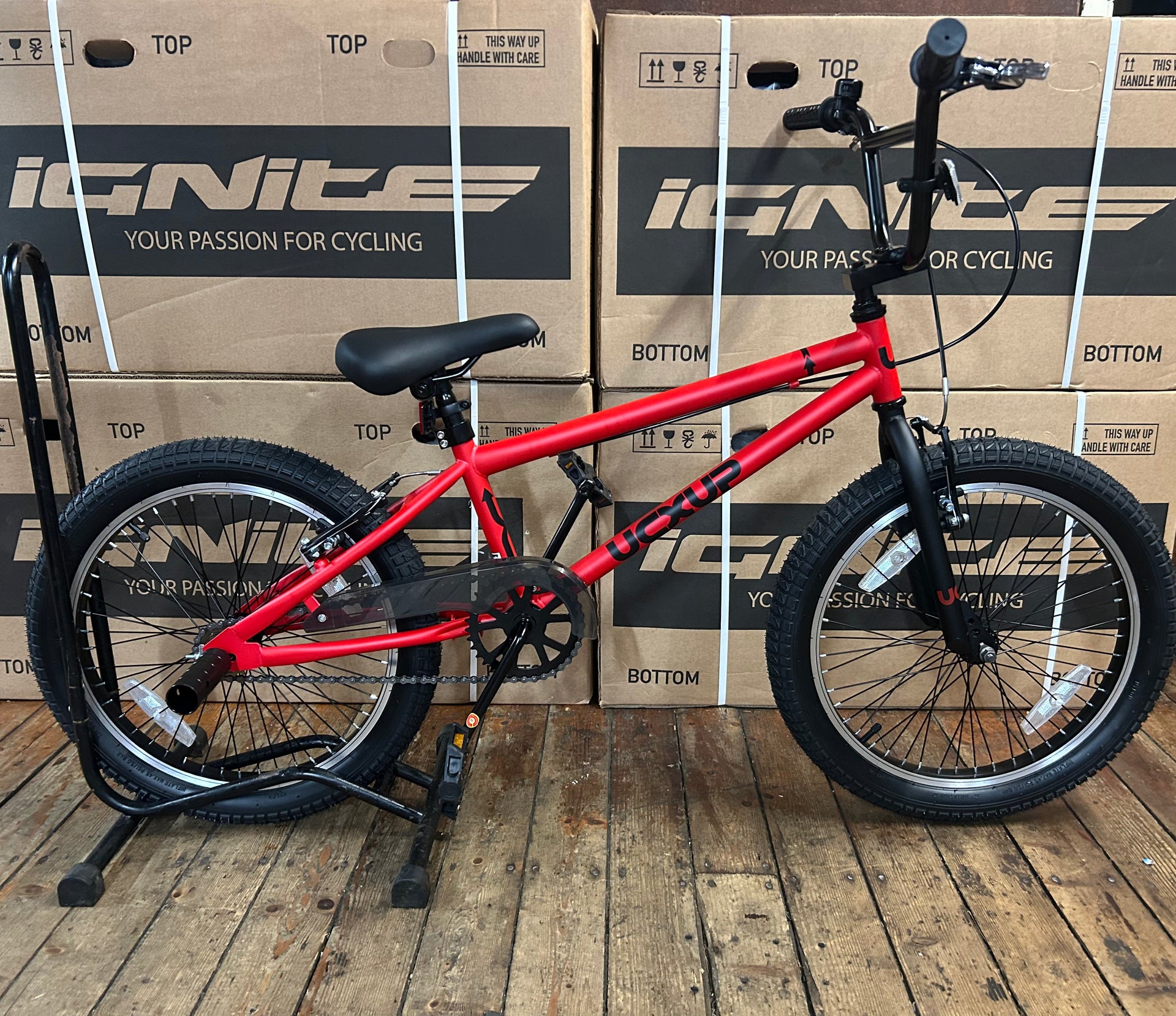 red bmx bicycle 20” UCXUP BMX Red